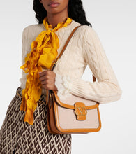 Valentino Garavani 9to5 VLogo Signature canvas shoulder bag