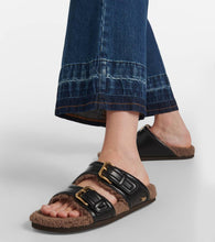 Valentino Garavani Faux fur-trimmed leather sandals