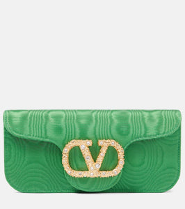 Valentino Garavani Loc√É¬≤ Mini embellished moir√É¬© clutch. Shop Valentino Garavani Clutches for women now.