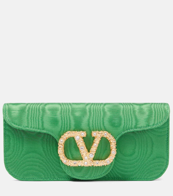 Valentino Garavani Loc√É¬≤ Mini embellished moir√É¬© clutch. Shop Valentino Garavani Clutches for women now.