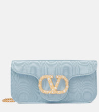 Valentino Garavani Loc√É¬≤ Mini embellished moir√É¬© shoulder bag. Shop Valentino Garavani Clutches for women now.