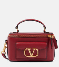 Valentino Garavani Loc√É¬≤ Small leather vanity bag. Shop Valentino Garavani Top-Handle Bags for women now.