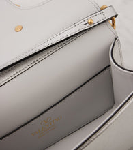 Valentino Garavani Loc√É¬≤ Small metallic leather shoulder bag