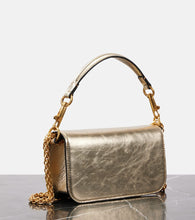 Valentino Garavani Loc√É¬≤ Small metallic leather shoulder bag