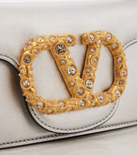 Valentino Garavani Loc√É¬≤ Small metallic leather shoulder bag