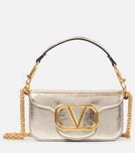 Valentino Garavani Loc√É¬≤ Small metallic leather shoulder bag. Shop Valentino Garavani Top-Handle Bags for women now.