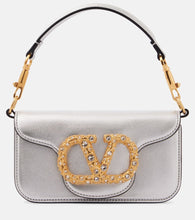 Valentino Garavani Loc√É¬≤ Small metallic leather shoulder bag. Shop Valentino Garavani Top-Handle Bags for women now.
