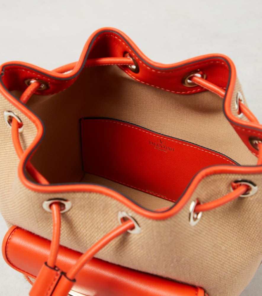 Valentino Garavani Loc√É¬≤ Small raffia-effect bucket bag