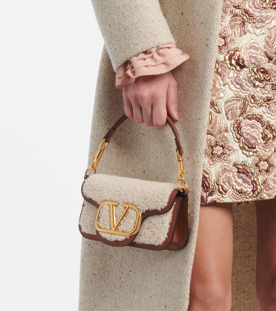 Valentino Garavani Loc√É¬≤ Small shearling and leather shoulder bag