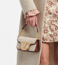 Valentino Garavani Loc√É¬≤ Small shearling and leather shoulder bag