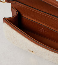 Valentino Garavani Loc√É¬≤ Small shearling and leather shoulder bag