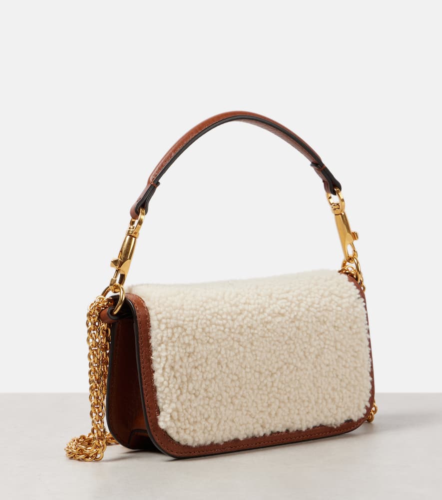 Valentino Garavani Loc√É¬≤ Small shearling and leather shoulder bag