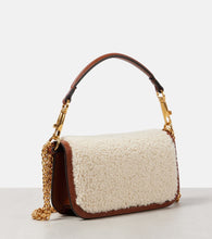 Valentino Garavani Loc√É¬≤ Small shearling and leather shoulder bag