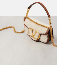 Valentino Garavani Loc√É¬≤ Small shearling and leather shoulder bag