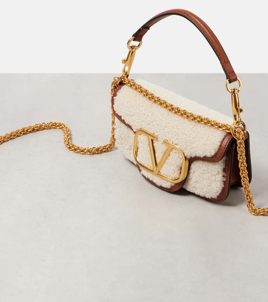 Valentino Garavani Loc√É¬≤ Small shearling and leather shoulder bag