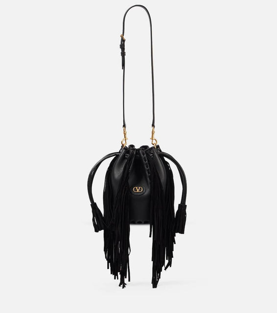 Valentino Garavani Nellc√É¬¥te Small fringed leather bucket bag. Shop Valentino Garavani Crossbody Bags for women now.