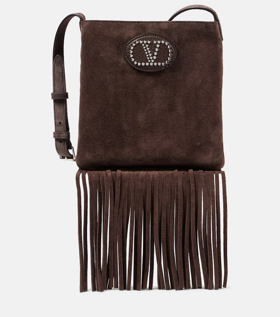 Valentino Garavani Nellc√É¬¥te fringed suede crossbody bag. Shop Valentino Garavani Crossbody Bags for women now.