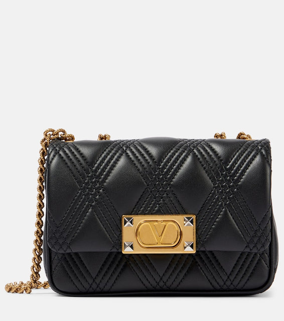 Valentino Garavani Quiltie 67 Small leather shoulder bag. Shop Valentino Garavani Crossbody Bags for women now.