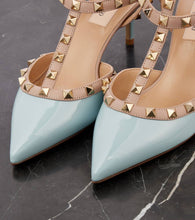 Valentino Garavani Rockstud Caged 65 patent leather pumps