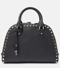 Valentino Garavani Rockstud Medium leather tote bag. Shop Valentino Garavani Top-Handle Bags for women now.