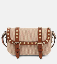 Valentino Garavani Rockstud Micro canvas crossbody bag. Shop Valentino Garavani Crossbody Bags for women now.