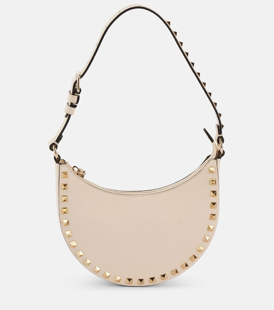 Valentino Garavani Rockstud Mini leather tote bag. Shop Valentino Garavani Shoulder Bags for women now.