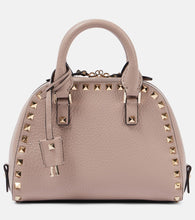 Valentino Garavani Rockstud Small leather tote bag. Shop Valentino Garavani Top-Handle Bags for women now.