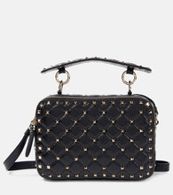 Valentino Garavani Rockstud Spike Small leather crossbody bag. Shop Valentino Garavani Top-Handle Bags for women now.