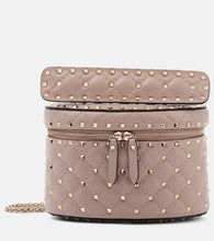 Valentino Garavani Rockstud Spike Small leather vanity bag. Shop Valentino Garavani Top-Handle Bags for women now.