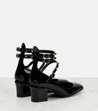 Valentino Garavani Rockstud patent leather pumps