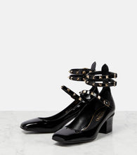 Valentino Garavani Rockstud patent leather pumps