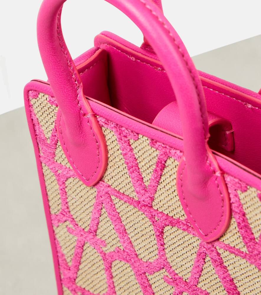 Valentino Garavani Toile Iconographe leather-trimmed crossbody bag