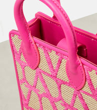 Valentino Garavani Toile Iconographe leather-trimmed crossbody bag