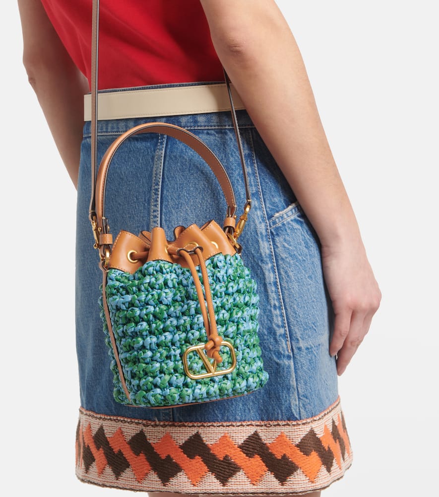 Valentino Garavani VLogo Mini embellished raffia bucket bag