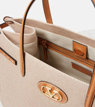 Valentino Garavani VLogo Mini leather-trimmed shoulder bag