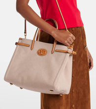 Valentino Garavani VLogo Mini leather-trimmed shoulder bag