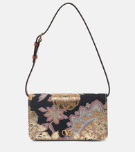 Valentino Garavani VLogo Signature Mini jacquard shoulder bag. Shop Valentino Garavani Shoulder Bags for women now.