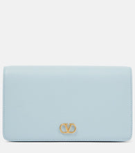 Valentino Garavani VLogo Signature Mini leather shoulder bag. Shop Valentino Garavani Shoulder Bags for women now.