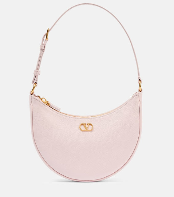 Valentino Garavani VLogo Signature Mini leather shoulder bag. Shop Valentino Garavani Top-Handle Bags for women now.