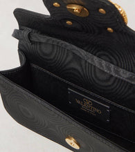 Valentino Garavani VLogo Signature embellished moir√É¬© clutch