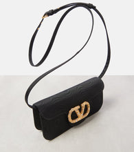 Valentino Garavani VLogo Signature embellished moir√É¬© clutch