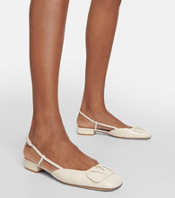 Valentino Garavani VLogo Signature patent leather slingback pumps