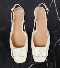 Valentino Garavani VLogo Signature patent leather slingback pumps