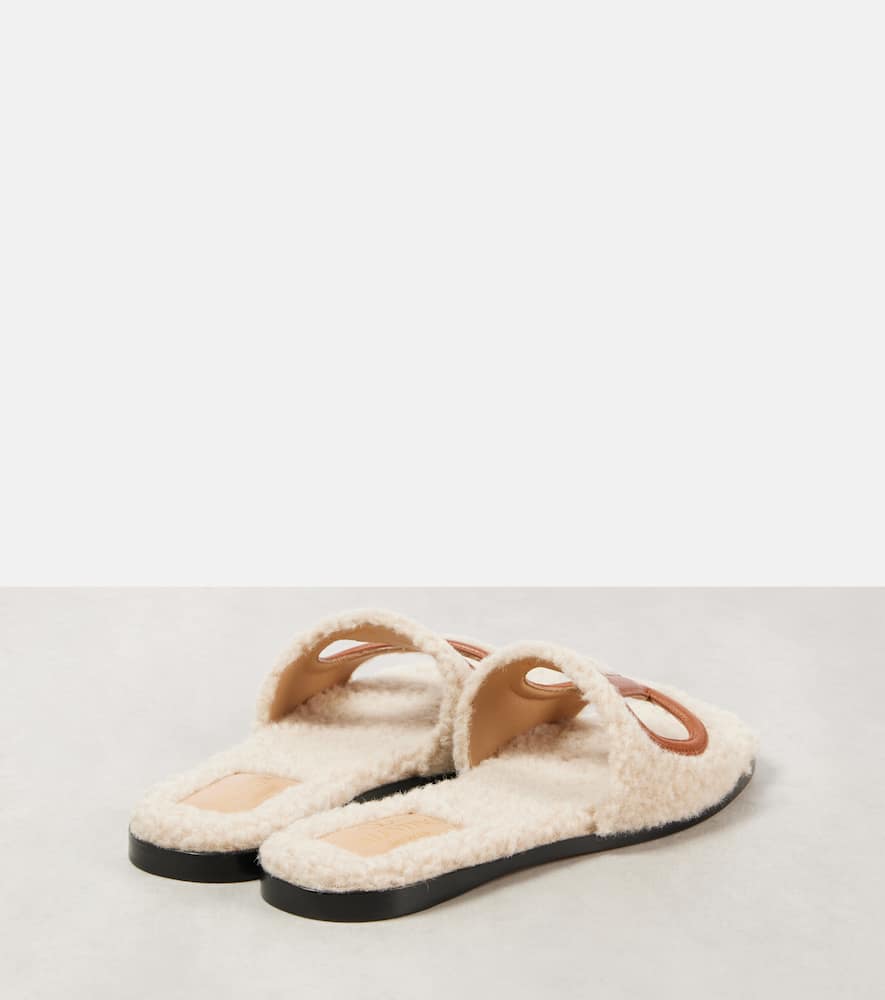 Valentino Garavani VLogo cutout faux shearling slides