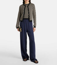 Valentino Garavani VLogo cutout faux shearling slides