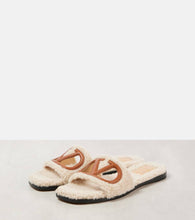 Valentino Garavani VLogo cutout faux shearling slides