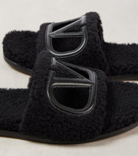 Valentino Garavani VLogo cutout faux shearling slides