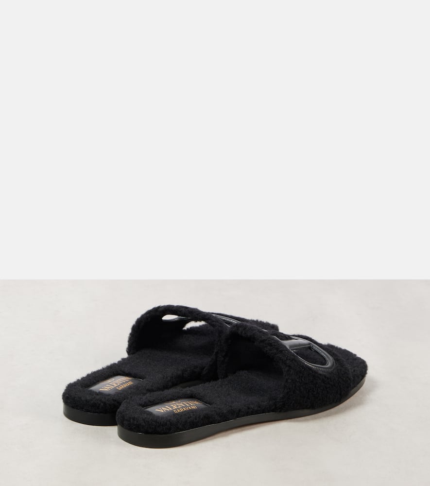 Valentino Garavani VLogo cutout faux shearling slides
