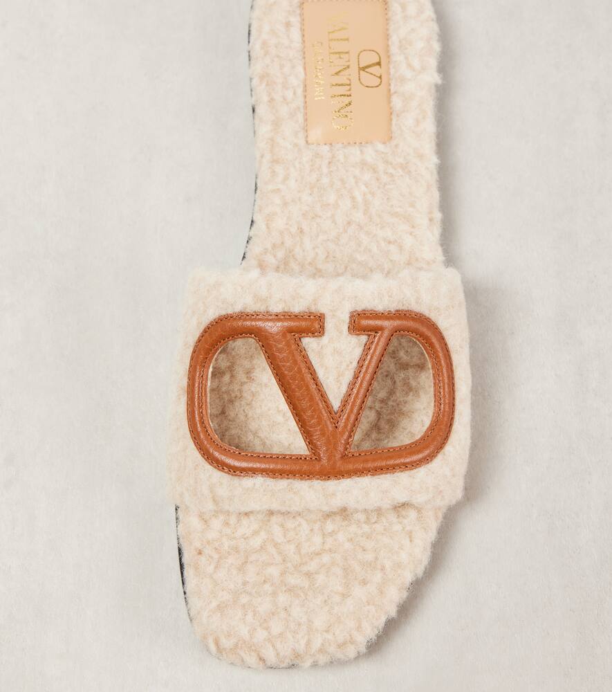 Valentino Garavani VLogo cutout faux shearling slides