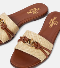 Valentino Garavani VLogo raffia-trimmed leather slides